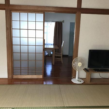 Golden Mile Apartment Amami Exterior photo