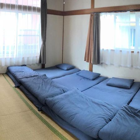 Golden Mile Apartment Amami Exterior photo