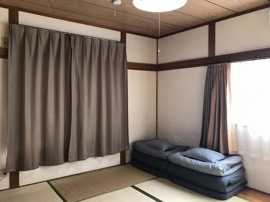 Golden Mile Apartment Amami Exterior photo