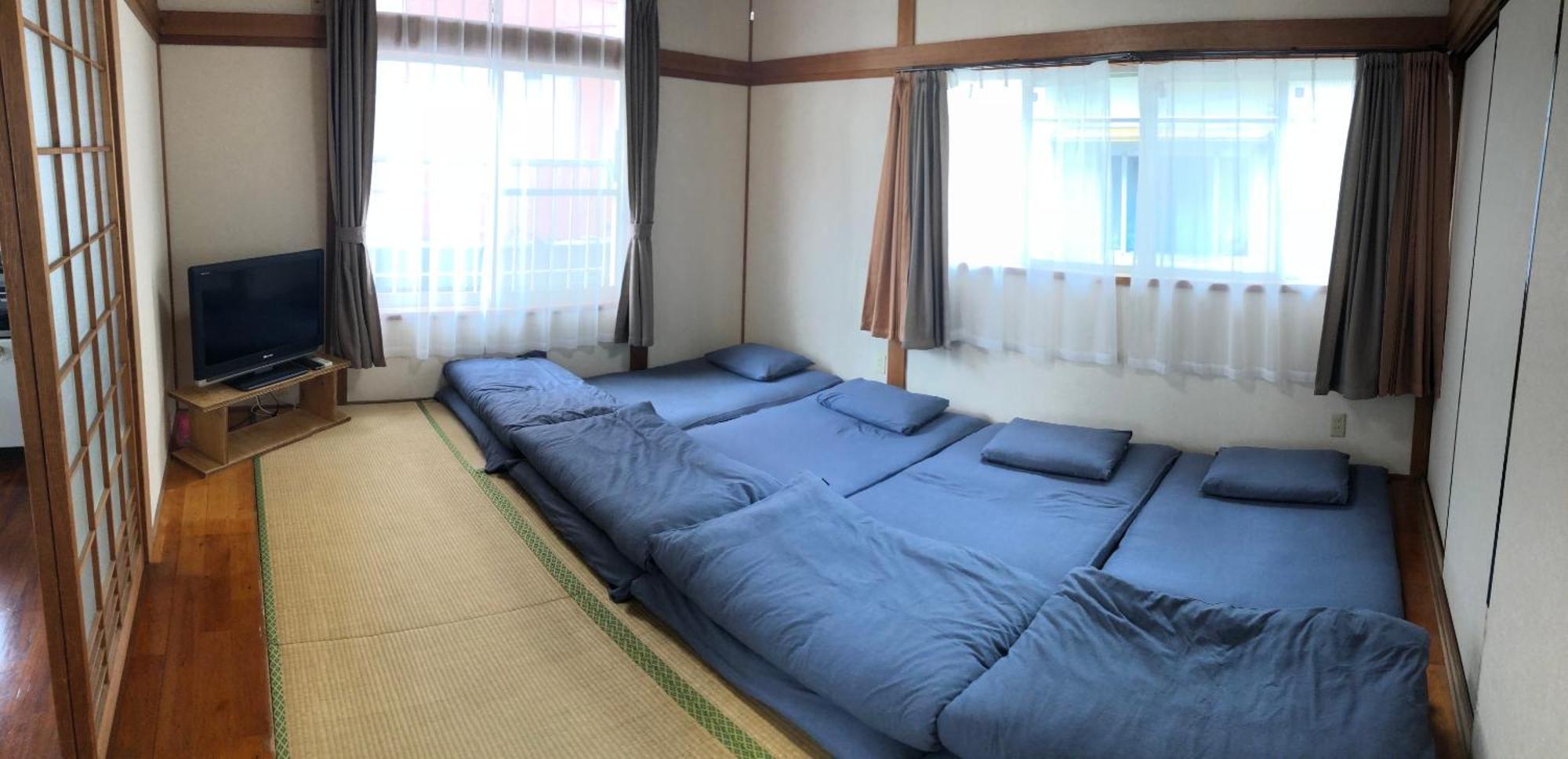 Golden Mile Apartment Amami Exterior photo